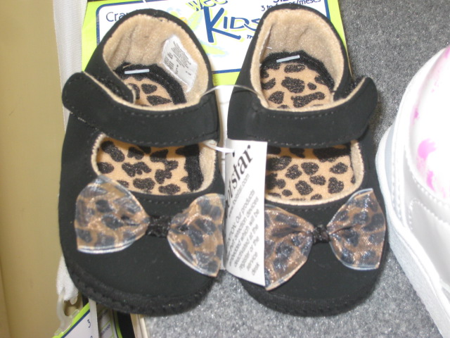 Zapatitos de bebe en negro y guepardo